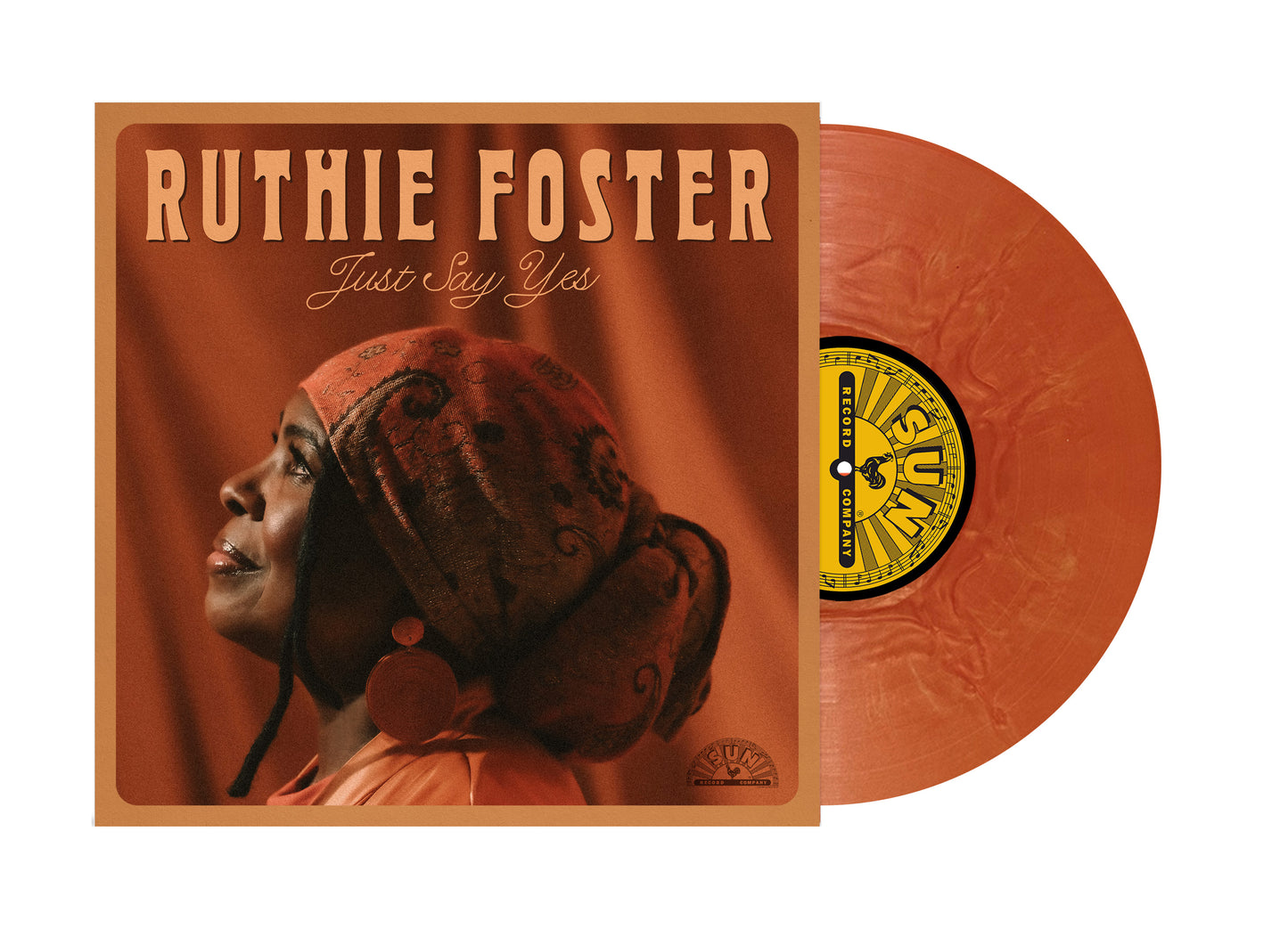 Vinyl record with cover featuring a person wearing a headscarf, titled 'Ruthie Foster Just Say Yes'.