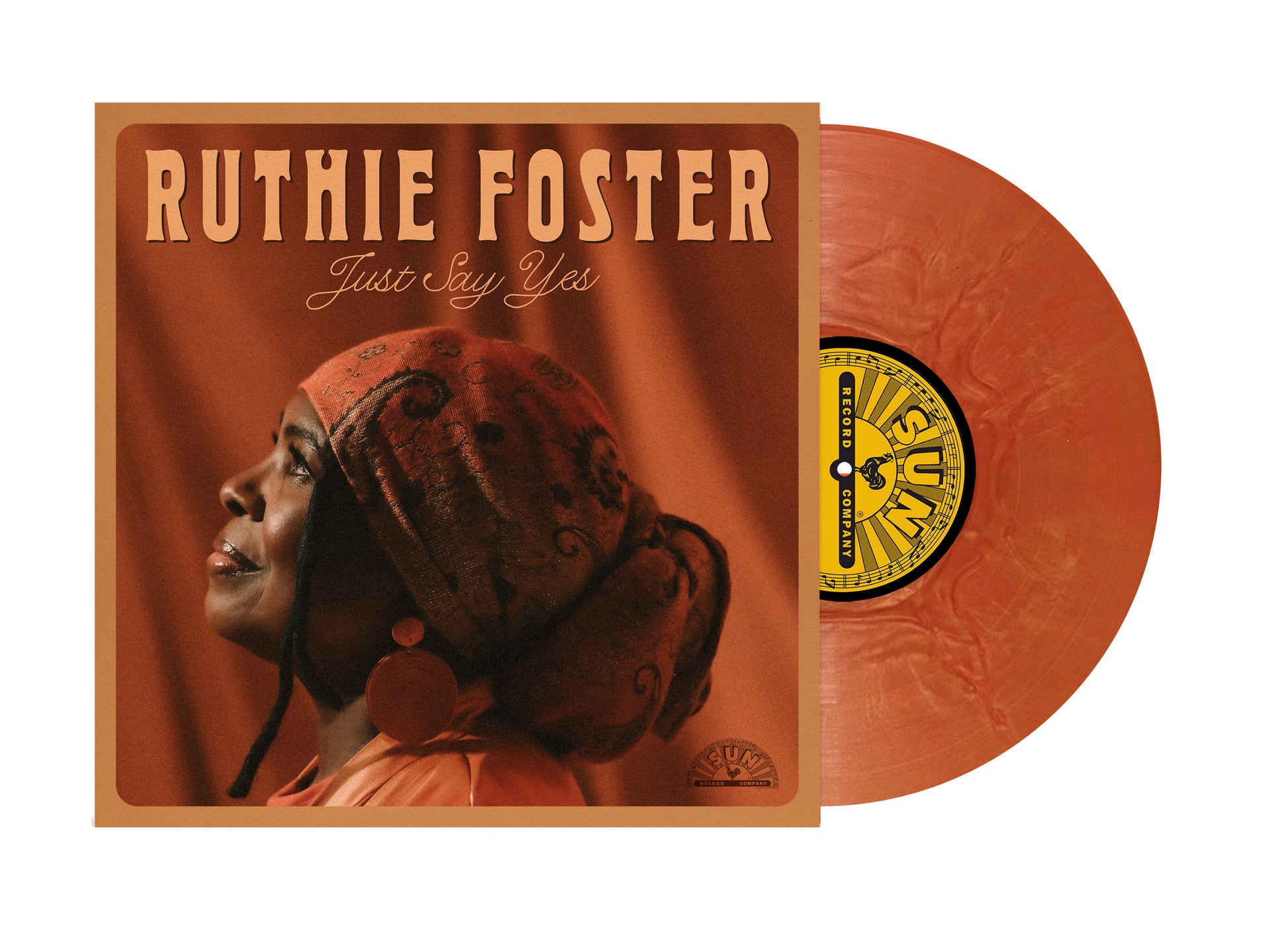 Vinyl record with cover featuring a person wearing a headscarf, titled 'Ruthie Foster Just Say Yes'.